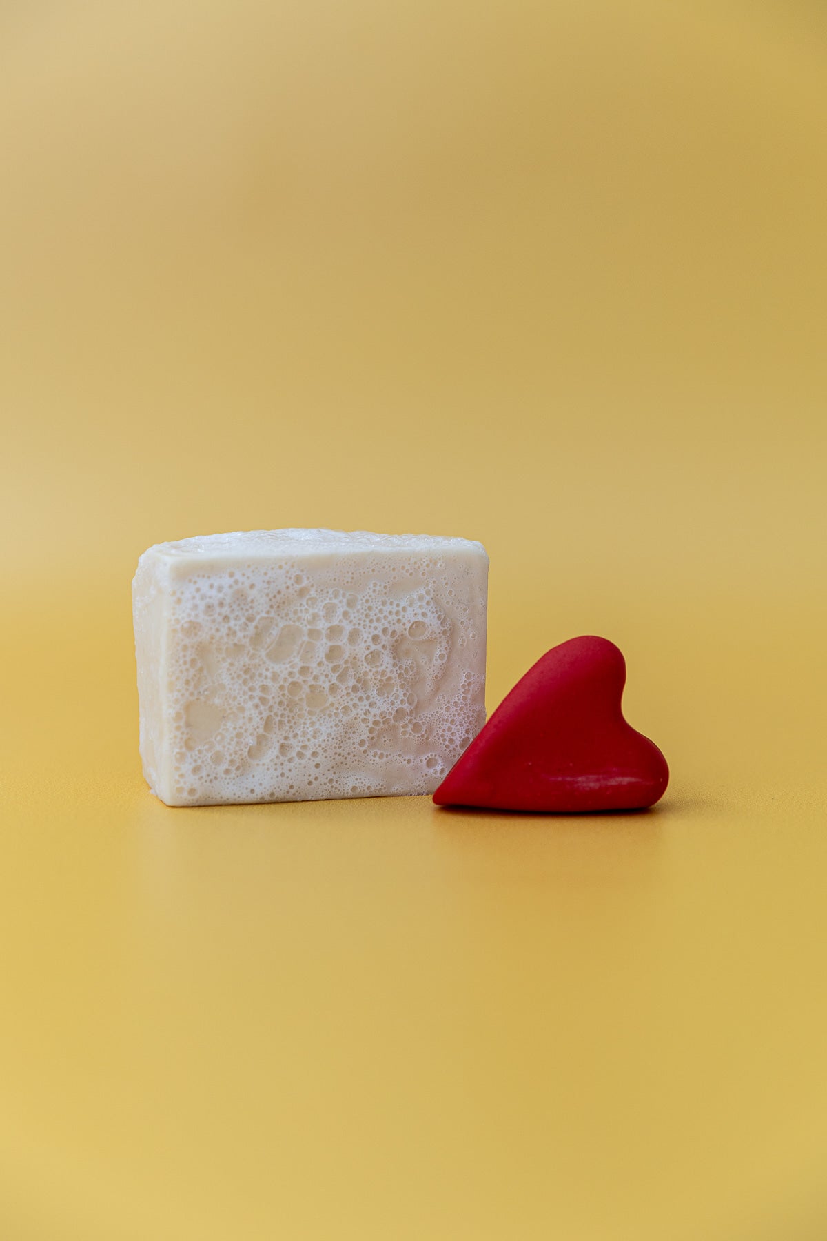 My Soap Shop OG Clean Skincare Soap lather with love heart on yellow background